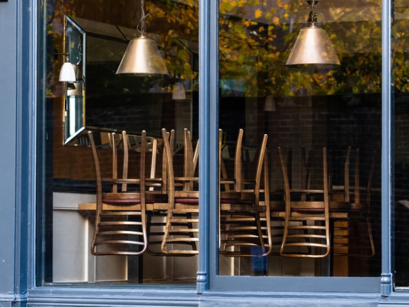 Window-of-an-empty-restaurant-forced-to-close-amid-covid-19-pandemic_crop